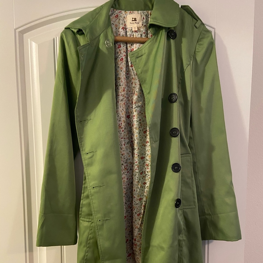 Green rain trench coat
